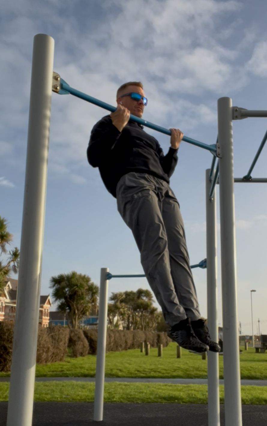 Donovan training — pull-ups on outdoor bars